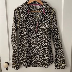 Long sleeve animal print collared shirt.